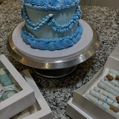 Baby shower cake package with treats display